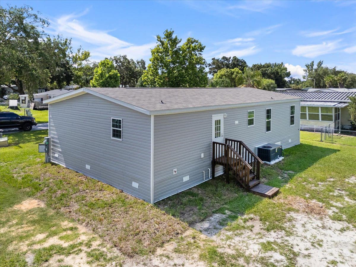 9060 sarah drive, polk city, florida 33868 (sold) exterior home features
