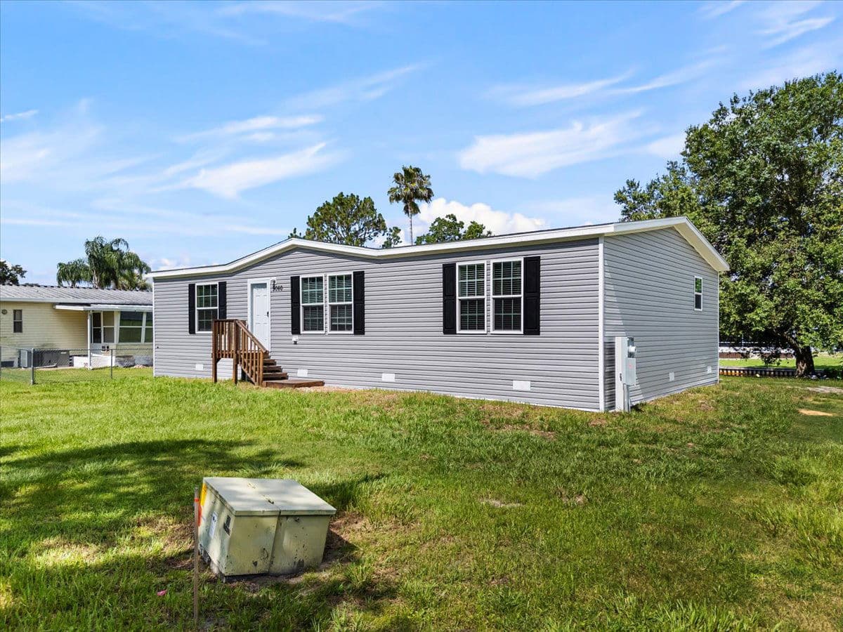 9060 sarah drive, polk city, florida 33868 (sold) exterior home features