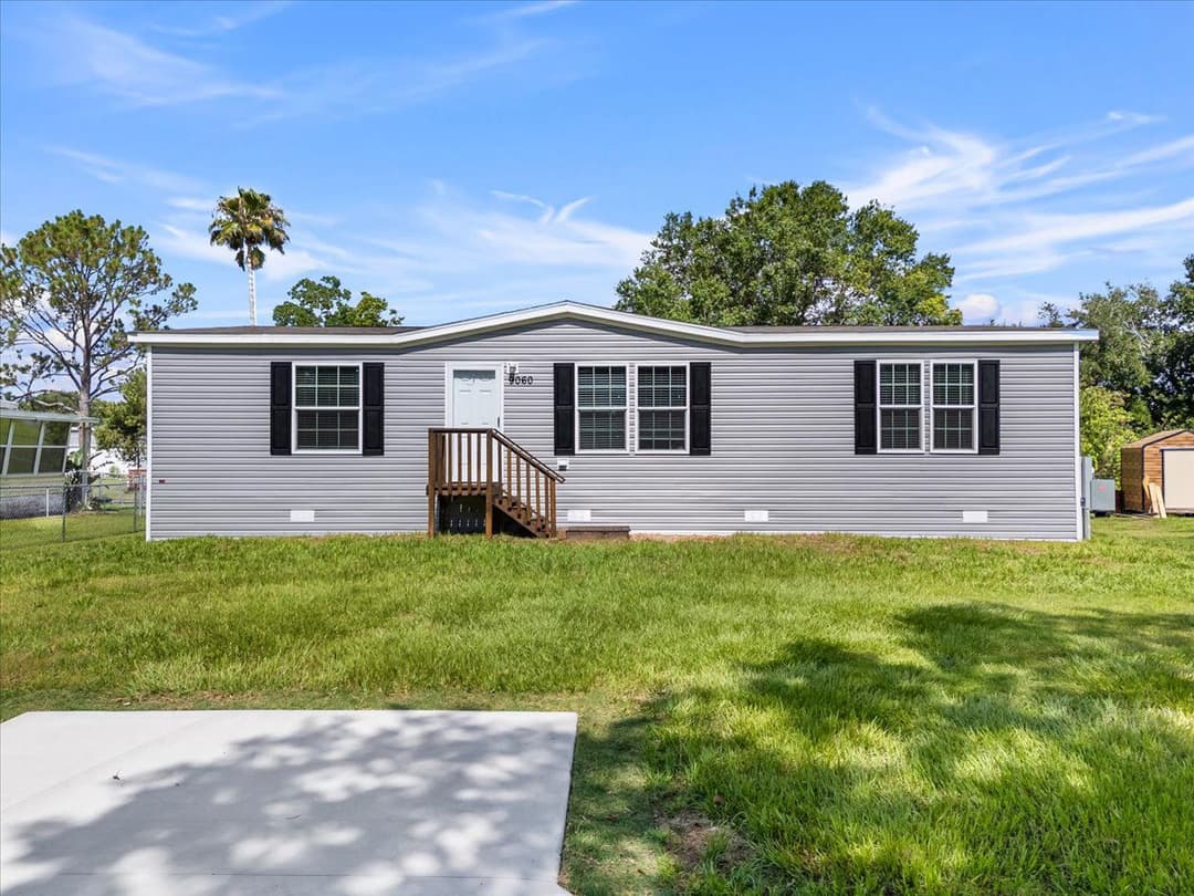 9060 sarah drive, polk city, florida 33868 (sold) exterior home features