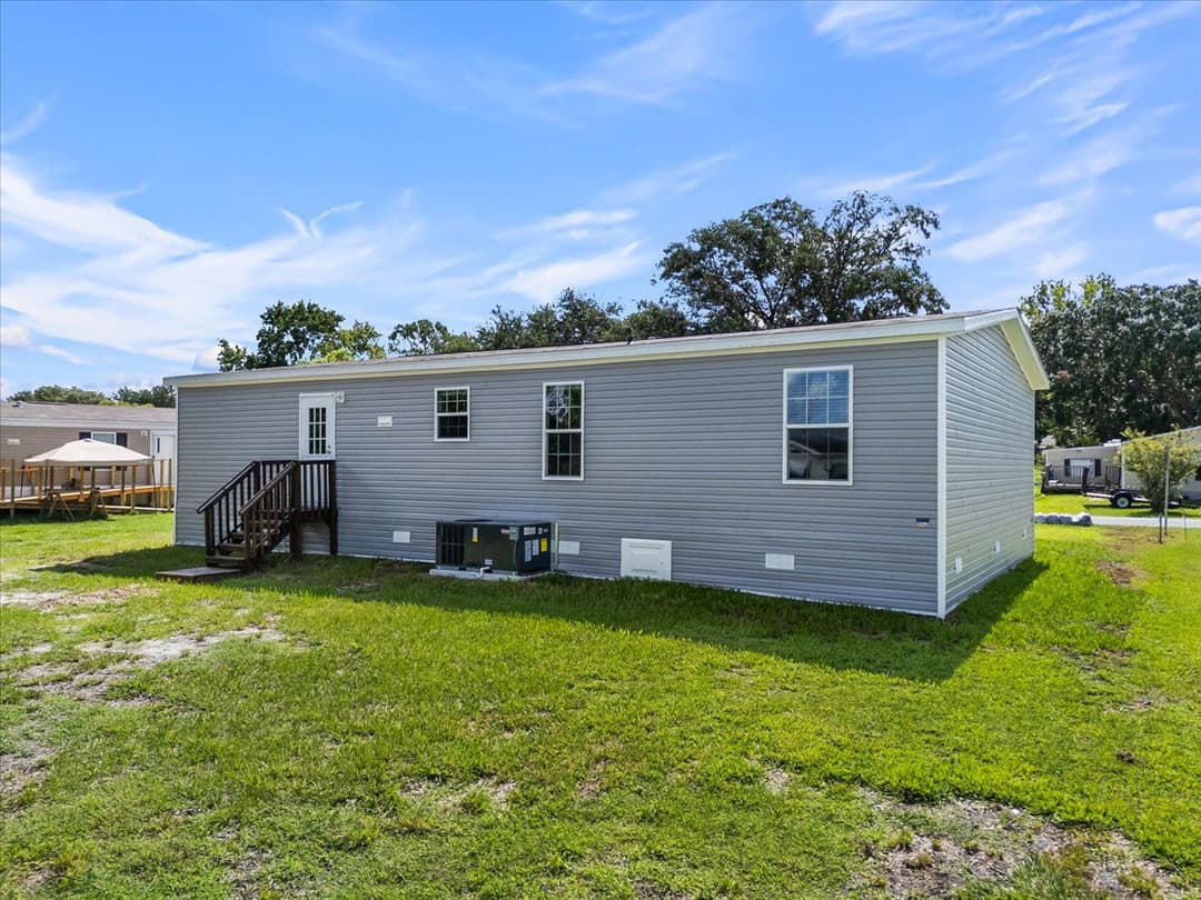 9060 sarah drive, polk city, florida 33868 (sold) exterior home features